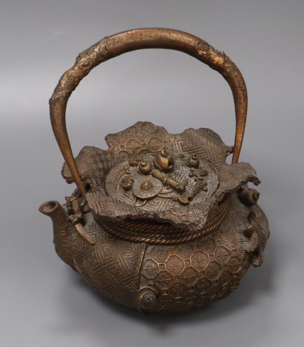 A Chinese iron teapot and cover, height 16cm